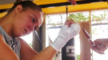 Ronda Rousey receives personalized tape from fan messages worldwide