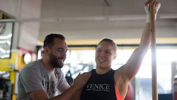 Rousey wants to be UFC, boxing & WWE Divas champ