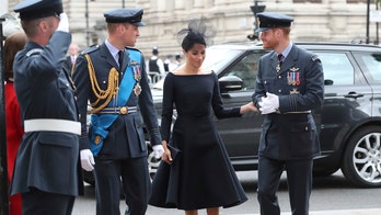 Meghan Markle sports Dior dress reminiscent of wedding gown at Royal Air Force event