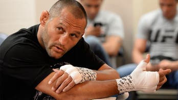 Dan Henderson returns to hotel room to find drunken, unwanted guest