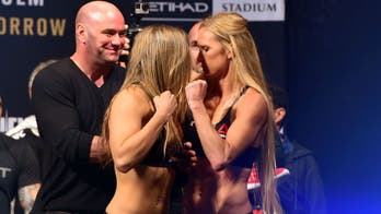 UFC Embedded: Holly Holm puts her fist in Ronda Rousey's face at the weigh-ins