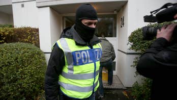 Germany bans Islamic organization, police raid 190 sites