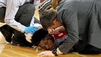 New Mexico forward Williams collapses on court in team's win