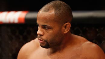 Daniel Cormier takes a shot at the official poster for UFC 210 in Buffalo
