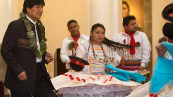 Bolivia's Morales approves coca law after treatment in Cuba