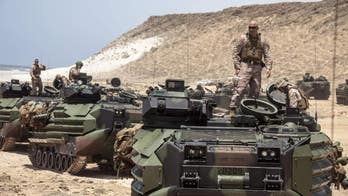 Marines Defend New Wheeled Amphibious Vehicle Design