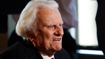 Billy Graham's final journey underway in North Carolina