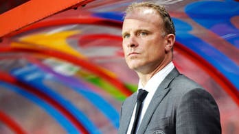 Ajax assistant Bergkamp rules himself out of Swansea running