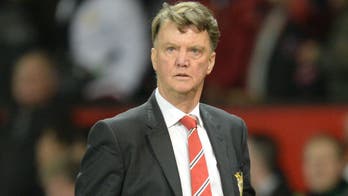 Van Gaal vows to fight on as Manchester United manager