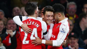Ozil the playmaker as Arsenal top Bournemouth
