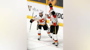 Flames blow 4-1 lead, rally to beat Predators 6-5 in OT