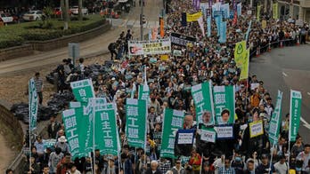 Thousands in Hong Kong march for pro-democracy lawmakers