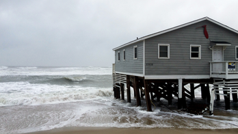 Maria, again a hurricane, swirls over North Carolina beaches