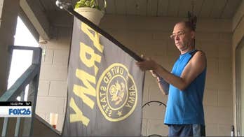 War veteran told to take down US flag