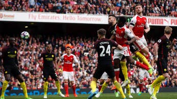 Arsenal twice comes from behind to hold Man City in league