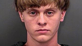 Dylann Roof 'self-radicalized' before church massacre, feds say