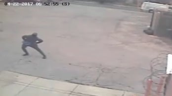 Philadelphia Dunkin' Donuts robber spotted stretching beforehand