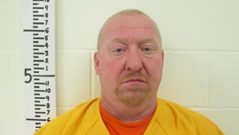 Dad accused of using front-end loader to pick up, drop son's mobile home