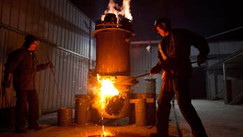 Molten iron creates bursts of light at Chinese New Year show