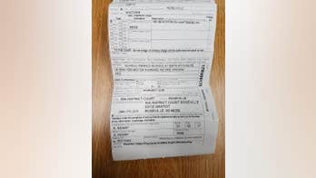 Driver ticketed for warming car in his own driveway