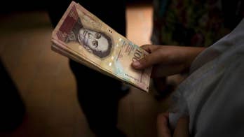 Venezuelans prepare for largest currency note to be yanked