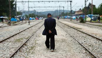 The Latest: EU extends border controls