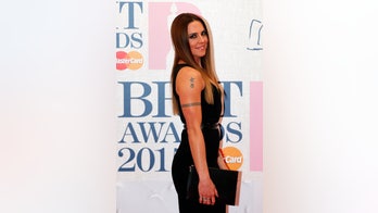 Sporty Spice Mel C flashes chiseled abs in topless photo on Instagram