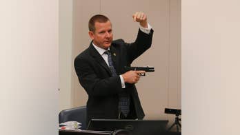 The Latest: Witness: Officer's DNA not found on victim