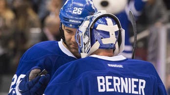 Bernier blanks Kings 5-0 for 1st win; Komarov and Grabner each score twice for Maple Leafs