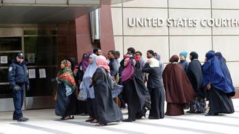 Minnesota men accused of seeking to join Islamic State group must stay in custody