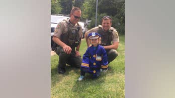 Kansas City police officers deliver surprise to 3-year-old aspiring cop