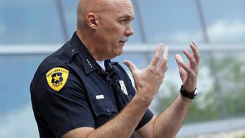 Officer seen on body cam striking woman, yelling expletives