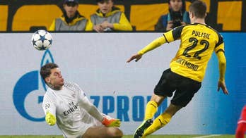 Pulisic scores 1st Champions League goal, lifting Dortmund