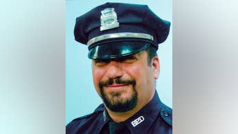 Police: Man with assault rifle, body armor shot 2 officers
