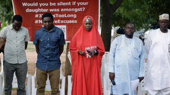 Nigeria schoolgirls: Parents of freed Chibok girls still wait to see them