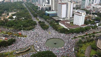 Police arrest leader of Muslim group behind Jakarta protests