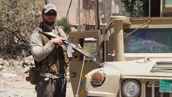 Former US Navy SEAL returns home after being shot by ISIS