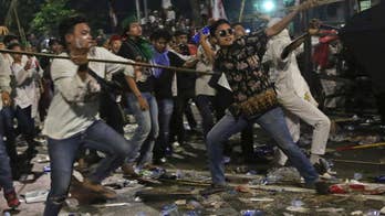 Indonesia police name Jakarta governor as blasphemy suspect