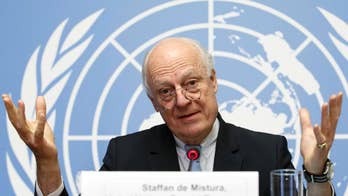 The Latest: Twin explosions rock refugee camp near Jordan