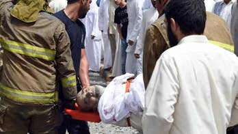 Kuwait mosque hit by IS suicide bomb reopens as fears remain