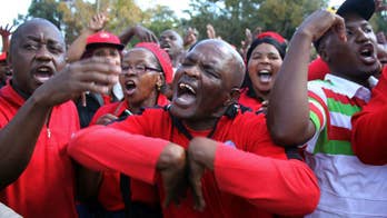 South African president jeered at May Day rally