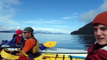 Taking the Kids -- and the true secret to vacation happiness -- asking their help planning