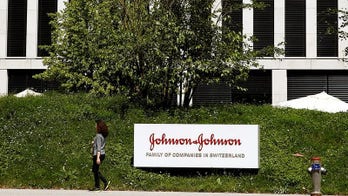 Judge halves $1B award in J&J hip implants case
