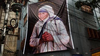 Mother Teresa honored as saint and model of mercy