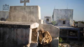 Grieving Haitians go into lifetime of debt to fund funerals