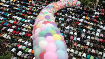 AP PHOTOS: Muslims mark start of Eid al-Adha holiday