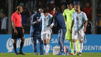 Argentine star Messi leaves Honduras match with back injury