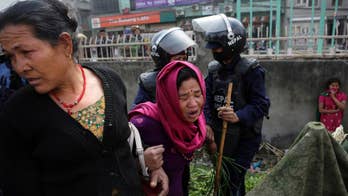 Police in Nepal capital tear down earthquake victim camp