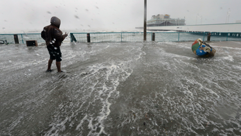 Storm surge warnings: Life-threatening, will cover a house