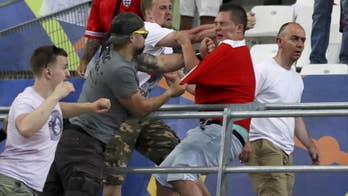 Hooliganism scars Euro 2016 as England, Russia risk ejection